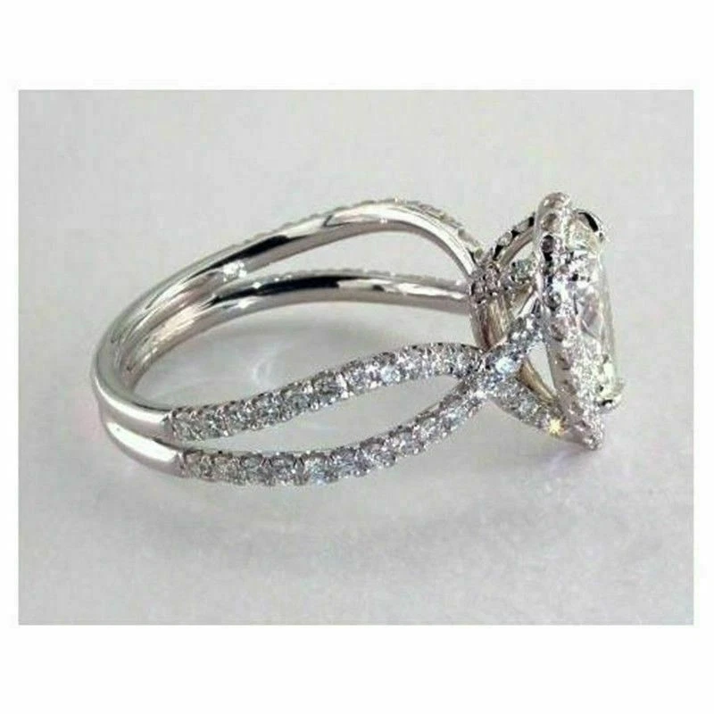 Anillo de compromiso con halo de oro blanco de 14 K de diamantes creados en laboratorio con corte pera de 2,1 quilates Foto 3 de 4