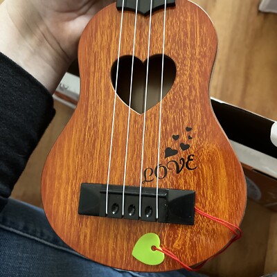 kids play guitar(plastic) Open Box, Gently Used