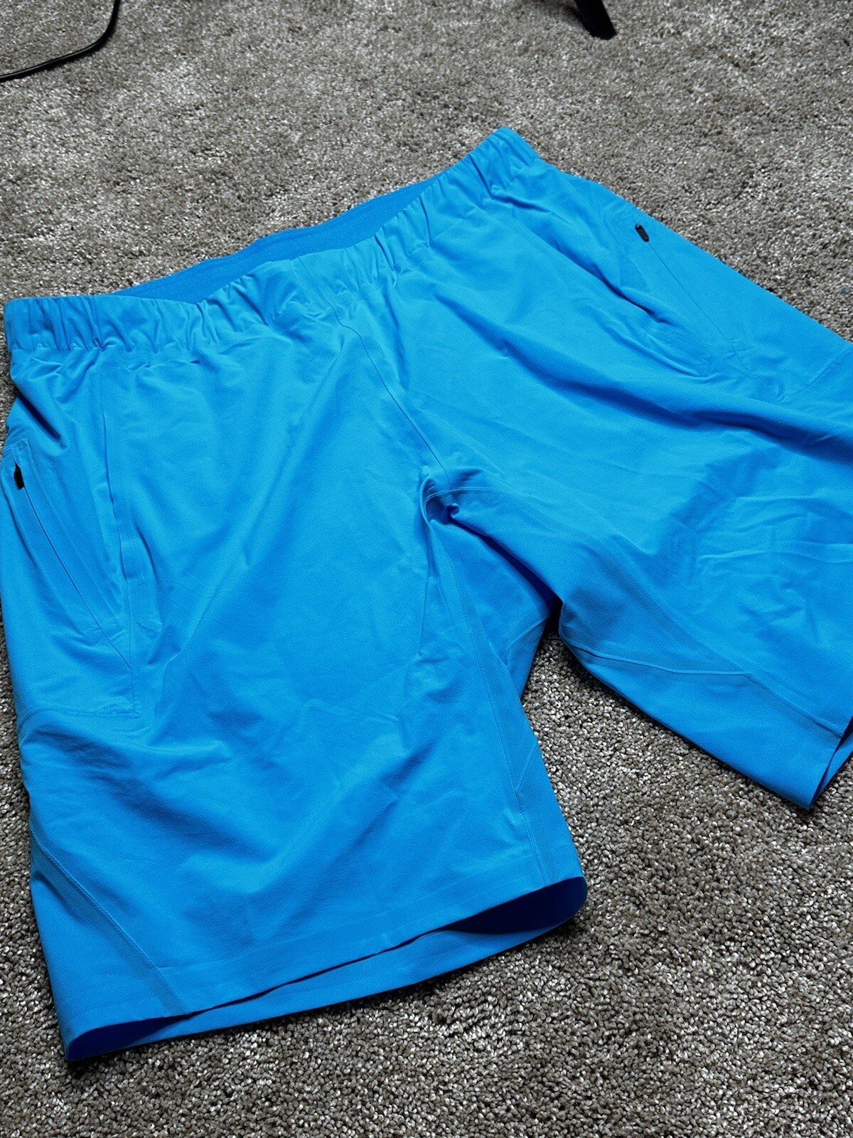 Arc'teryx Veilance Secant Comp cortometraggio da uomo blu acquacoltura piccolo nuovo