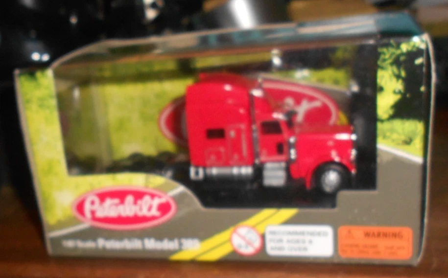 Camión Peterbilt 389 1:87 HO Logistics 4" plástico miniatura rojo nuevo en caja. Foto 2 de 4