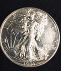 LOT # 1101    1943  WALKING LIBERTY HALF DOLLAR (AU'BU)