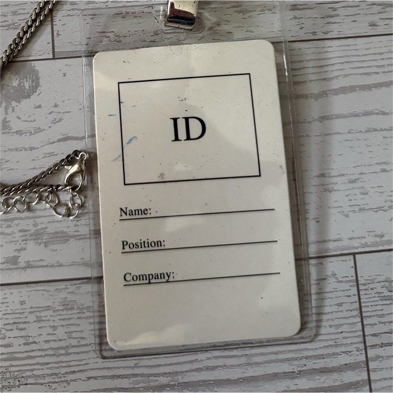 Women’s Silver ID Badge holder featuring a caduceus medical symbol