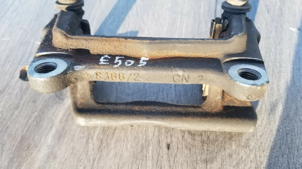 2004-2008 Audi A8 Quattro Rear Left Brake Caliper Mounting Bracket OEM - Image 4 of 4