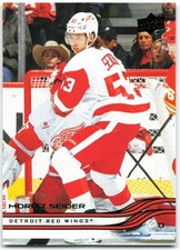 2025-26 Upper Deck Series 1 Holiday SP Green Foil #56 Moritz Seider Detroit Red