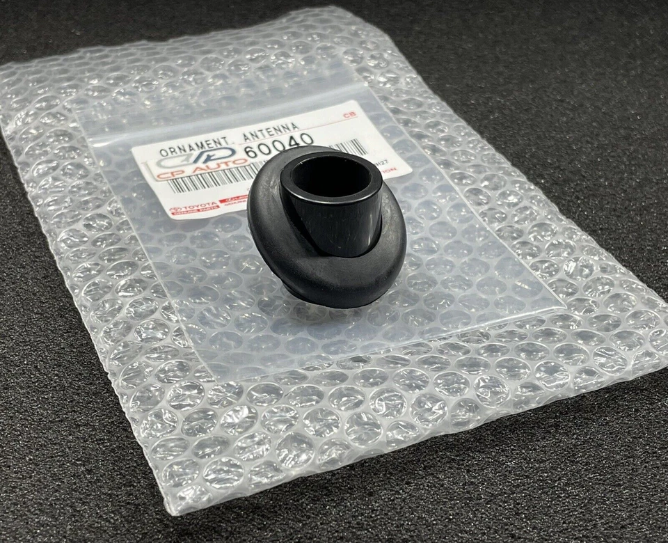 91-97 TOYOTA LAND CRUISER FJ80 FZJ80 ANTENA ADORNO CUBIERTA BISEL OEM NUEVO Foto 2 de 4