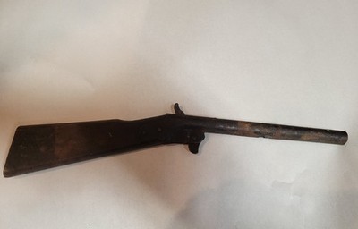Old 1950s wood toy for playing cowboys and indians Western cap