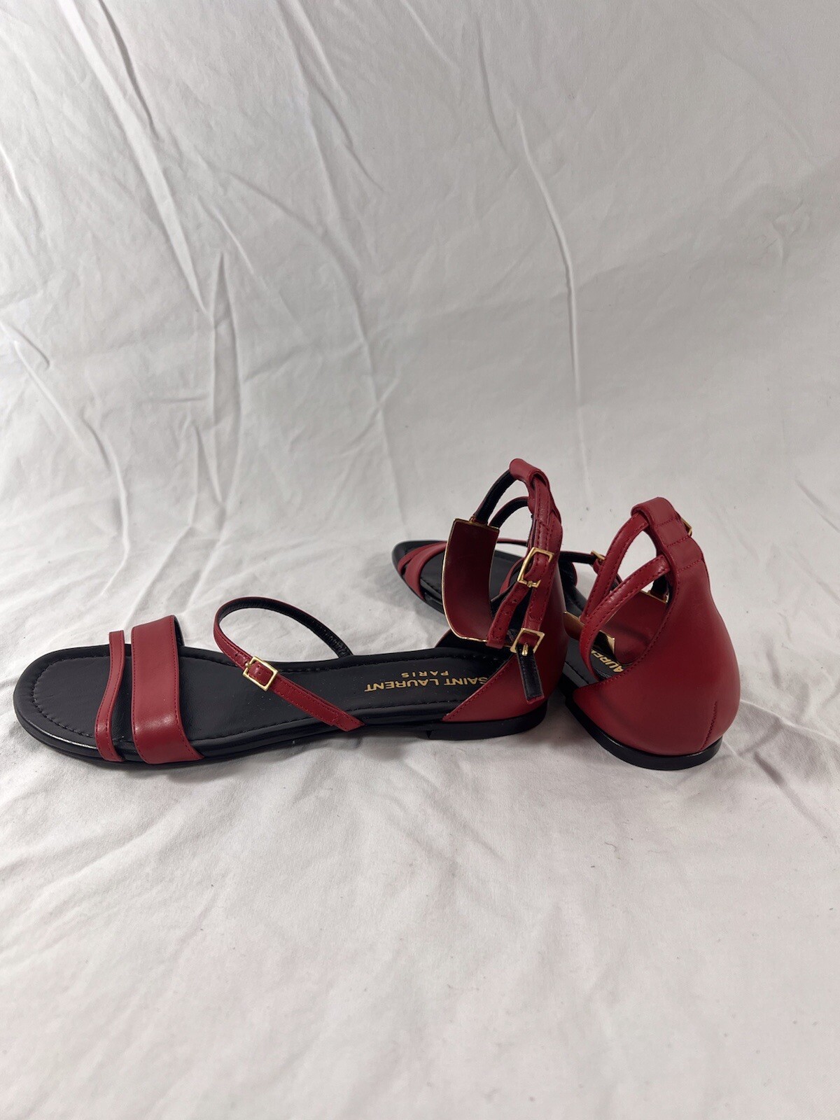 Sandali piatti Saint Laurent in pelle rossa Janis cinturino alla caviglia gladiatore 35 5 5 5 US