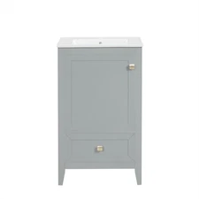 A bathroom cabinet with a sink and a soft-closing door