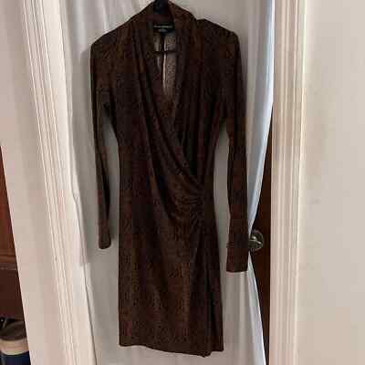 norma kamali brown dress Mesh-panelled Gown style bodice gracefully transitions into a fluted hem Knitted maxi dress in brown