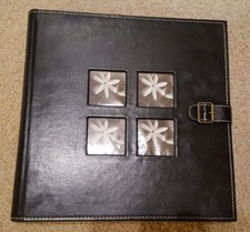 Black leather scrapbook. 40 pages. 13.5''x13.5''. New.