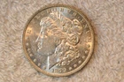 1879-O    AU/BU  MORGAN DOLLAR