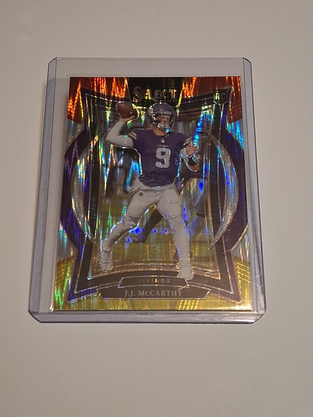 2024 Panini Select - Concourse J.J. McCarthy #24 Red & Yellow Shock Prizm (RC)