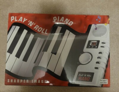 NEW Sharper Image 49 Key Play 'n' Roll Electronic Piano W / AC Power Supply