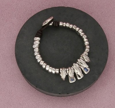 UNOde50 silver plated blue crystals with silver feathers bracelet. 7inch 