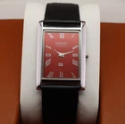 Vintage Seiko Slim Quartz Men's Wrist Watch Red Dial with Black Strap.