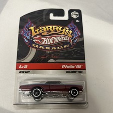 Hot Wheels 2009 Larry's Garage #6 '67 Pontiac GTO Maroon & Silver w/ Real Riders