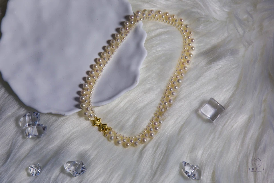 Collar de perlas de encaje casi redondo blanco cultivado en agua dulce natural Foto 4 de 4