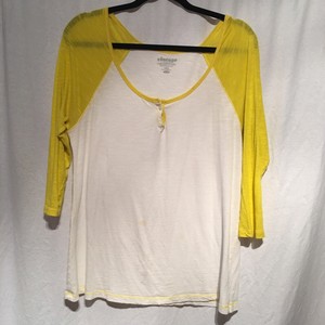yellow and white baseball top