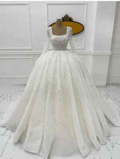 Luxury square neck wedding dress Dubai beaded long sleeved sheer wedding dress