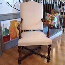 Sedia in legno con braccioli