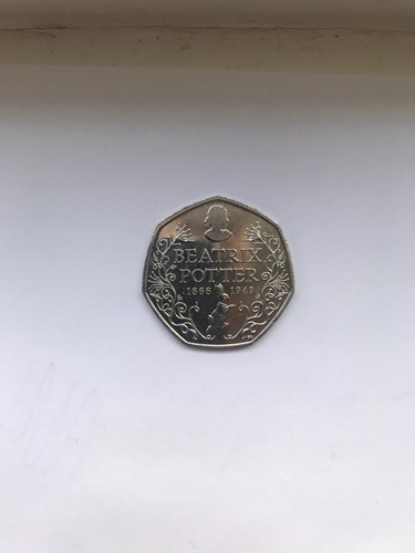 full set of beatrix potter 50p coins and new peter rabbit 50p