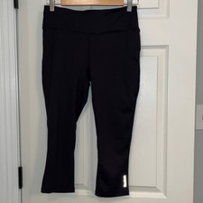 Medias capri para correr con inserción de malla negra Reebok para mujer talla mediana entrenamiento atlético