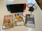 Nitntendo Switch Console and 3 Games