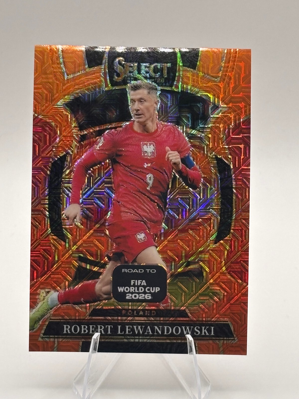2025-26 Panini Select Road to FIFA World Cup #37 Lewandowski Orange Mojo #/825