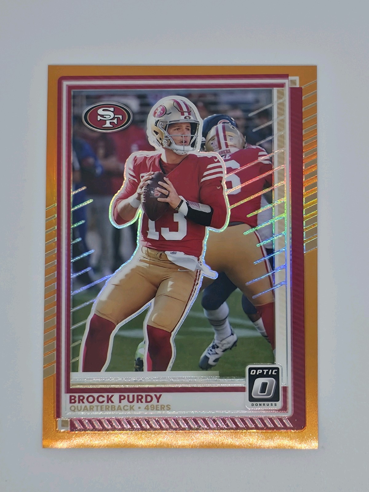 2025 Panini Donruss Optic - Brock Purdy #38 Orange Prizm /299 49ers