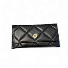 Black Chanel quilted leather accessory jewelry pouch mini case Italy