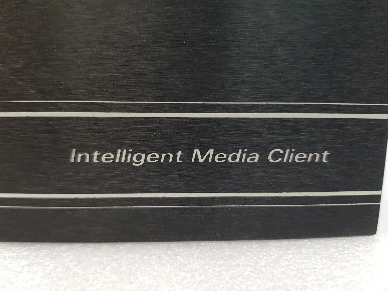 Intelligent Media Client legend on the brushed front panel of the ReQuest unit