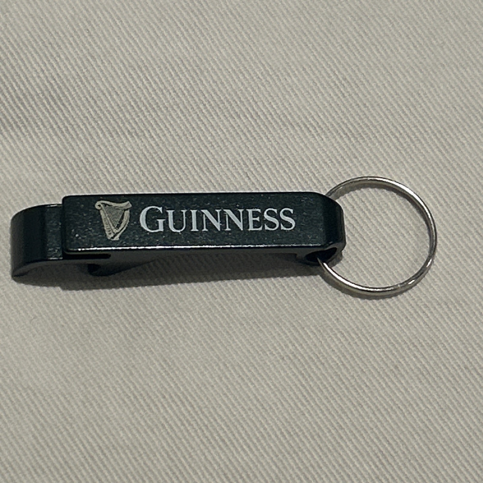 Lot of 39 Guinness Beer Promotional Black Keychain Beer Bottle Openers