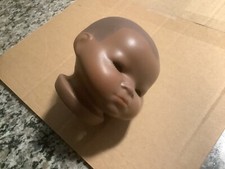 Black doll head signed on back of neck, Grace S. Putnam 1922