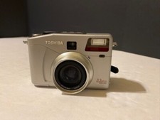 Toshiba Digital Still Camera MOdel PDR-M70 W/ New Charger and New Battery.