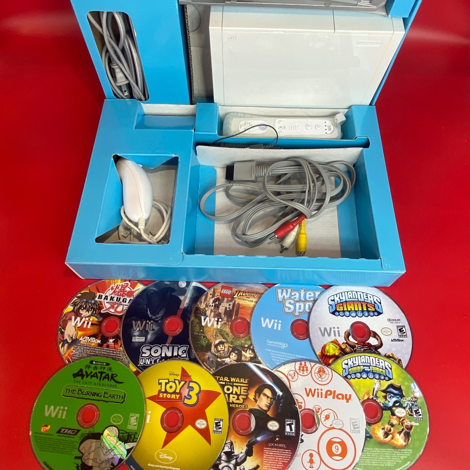 Nintendo Wii System Bundle w/ Ten Games & Motion Plus Controller Plays