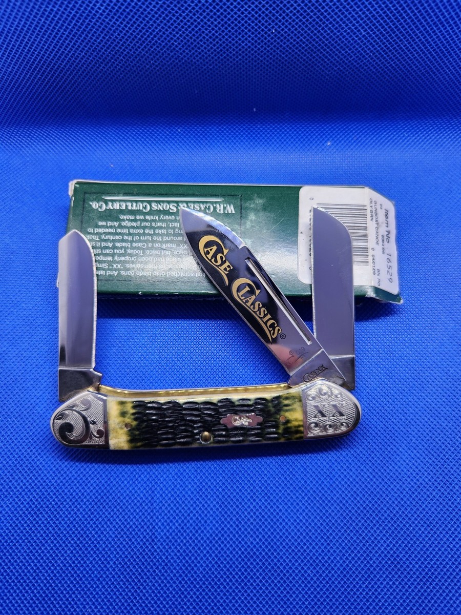 2009 Case XX 6394 Case Classic Gunboat Canoe Olive Green