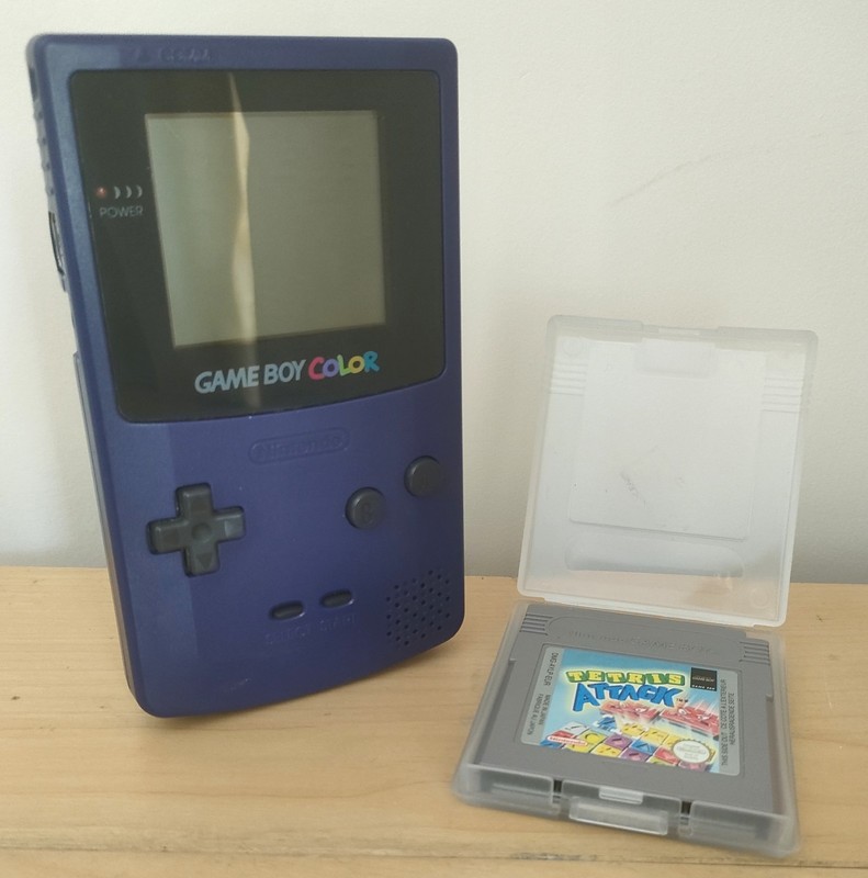 Nintendo Game Boy Color CGB-001 in Purple Plus Game.