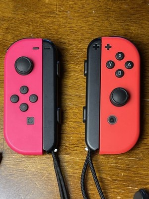 Nintendo Switch Joy-Con Controller Pair Neon Pink Red Pre owned READ