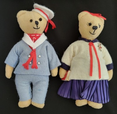 Pair of Bears dressed up as a Sailor and a School Girl. A really Cute Couple 2