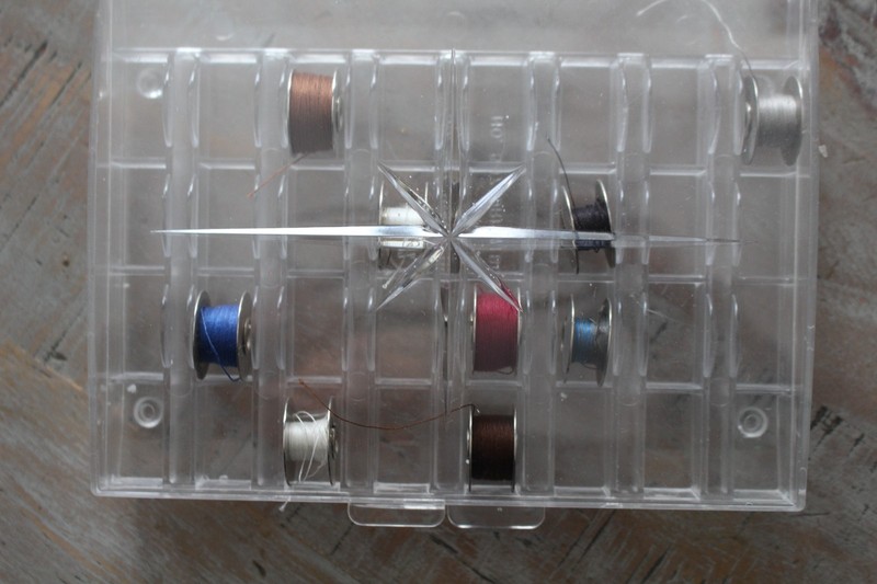 Vintage Metal Bobbins  in Case 32 holes
