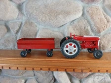 1950'S Hubley Diecast Tractor, Metal Rims,wide Front Steering W/Ertl Metal Trail