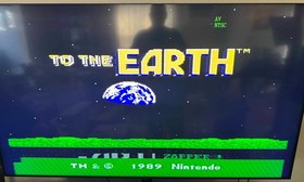 Nintendo NES To The Earth game cartridge with booklet and case - READ