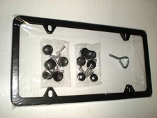 Stainless Steel LICENSE PLATE FRAME black w/ screw caps NEW NIB model # xclpf