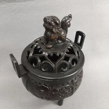 Metal incense burner, lion carving, openwork