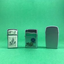 Zippo, 1 classic, 1 mini, 1 gas blu, senza scatole e senza garanzia.