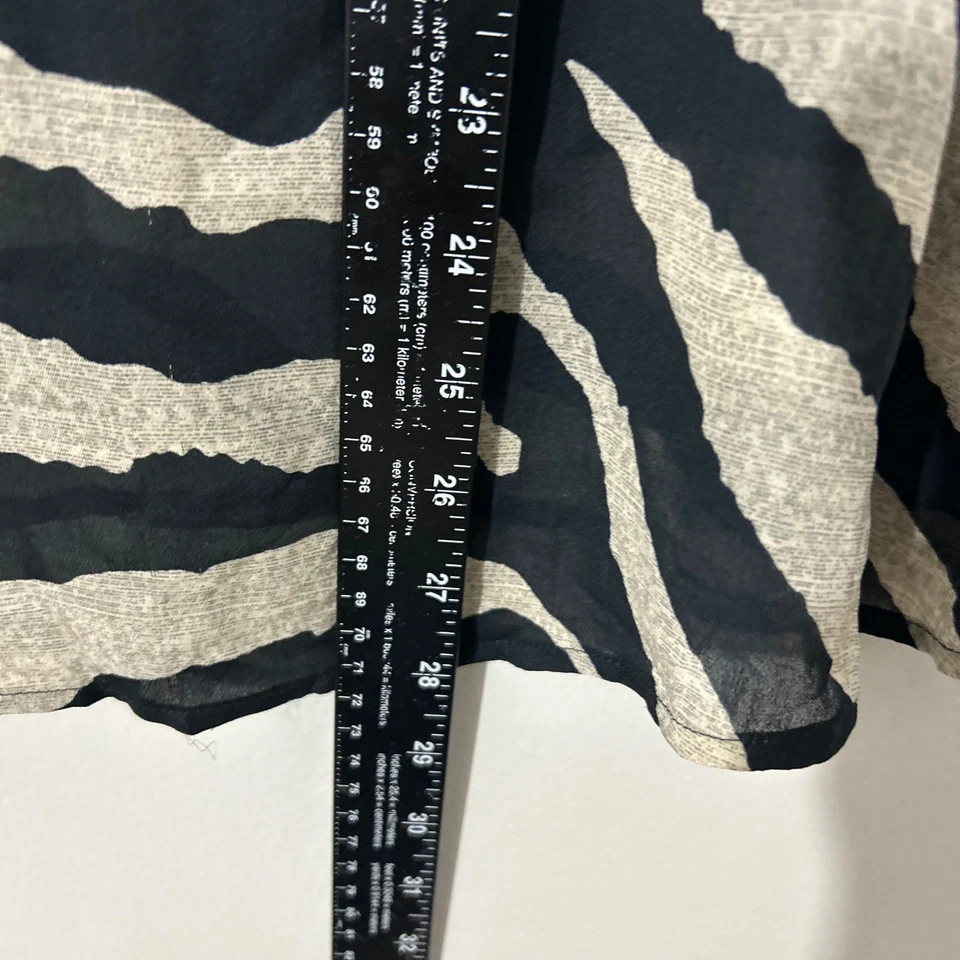 Camiseta sin mangas Cabi para mujer negra con estampado de cebra talla M Foto 4 de 4