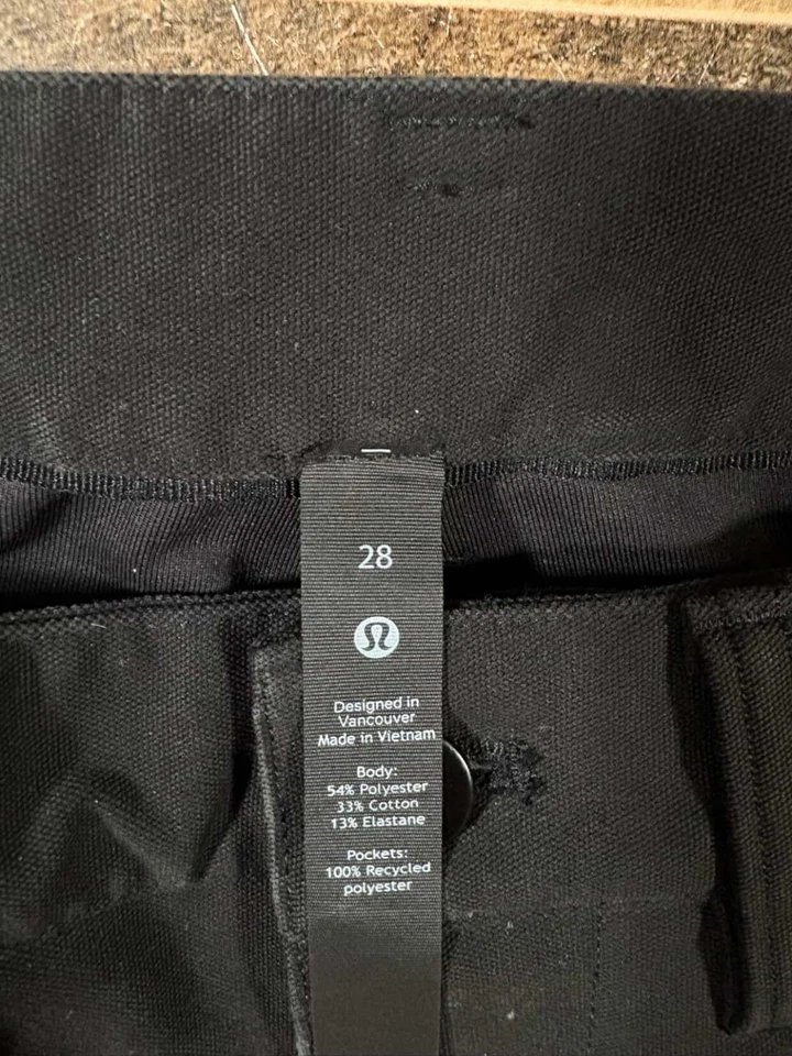 Pantalones chinos elásticos Lululemon ABC 28x30 negros ajustados Foto 3 de 4