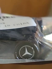 4 Black Aluminum Metal Wheel / Tire Valve Stem Air Caps Covers With Logo