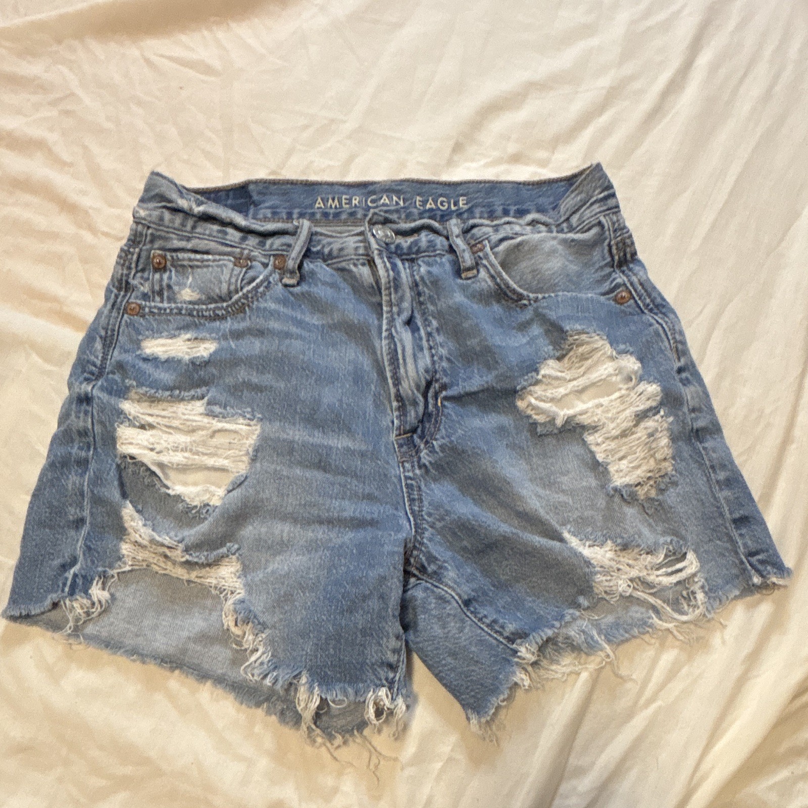 American Eagle Women's Cut Off Denim Shorts Medium Wash Mid Rise Distressed 0