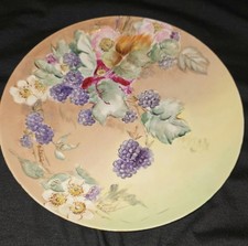 Haviland France Porcelain hand painted decorative plate with gold trim.